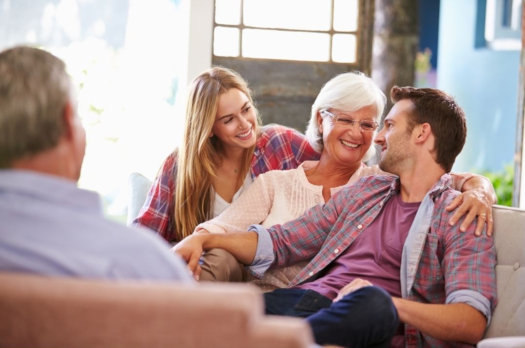 A family reviewing senior living options together